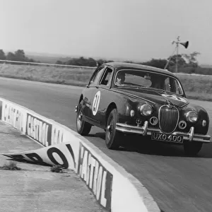 Jaguar 3. 4 Mark1 J. W. Dean at Silverstone 1961. Creator: Unknown