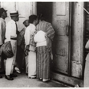 Japanese crowd looking into the Zeppelin hangar, Kasumigaura, Japan, 1929 (1933)