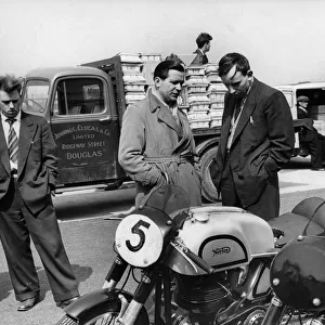 John Surtees with Nortons in paddock at 1954 Isle of Man T. T Creator: Unknown