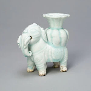 Joss-Stick Holder in the Form of an Elephant Holding a Lobed Vase, Yuan dynasty (1271-1368). Creator: Unknown