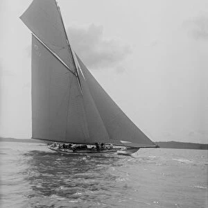 The Lady Anne 15 Metre class cutter sails upwind, 1912. Creator: Kirk & Sons of Cowes