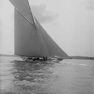 The Lady Anne 15 Metre class cutter sails upwind, 1912. Creator: Kirk & Sons of Cowes