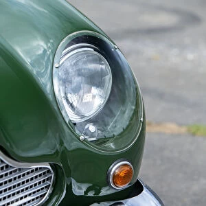 Left front headlight of a 1961 Aston Martin DB4 GT previously owned by Donald Campbell