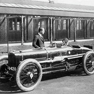 Leo Cozens and May Cunliffe with 1924 Sunbeam Grand Prix car. Creator: Unknown