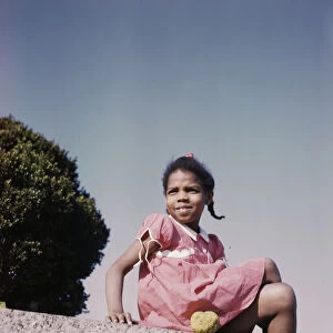 Little girl in a park near Union Station, Washington, D. C. ca. 1943. Creator: Unknown