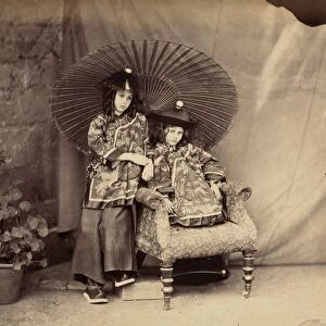 Lorina and Alice Liddell in Chinese Dress, 1860. Creator: Lewis Carroll