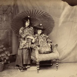 Lorina and Alice Liddell in Chinese Dress, 1860. Creator: Lewis Carroll