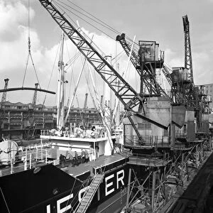 The Manchester Renown being loaded with steel for export, Manchester, 1964. Artist