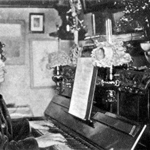 Maurice Rollinat, French poet, playing the piano, 1902