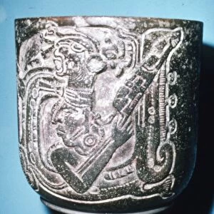 Mayan Pot of Man in high animal head-dress holding staff with lotus flower