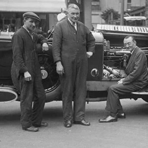 Four men posing beside a Minerva car. Artist: Bill Brunell
