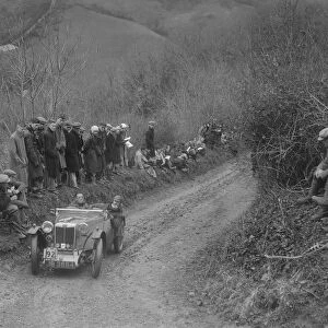 MG PA of Jack Bastock of the Cream Cracker Team competing in the MCC Lands End Trial, 1935