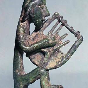 Minoan bronze of a harpist