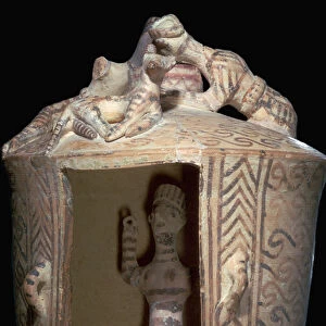 Minoan pottery shrine containing a goddess