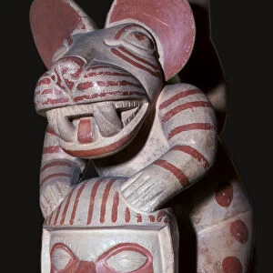 Mochica stirrup-spout vessel of a male figure with a jaguars head, 3rd century