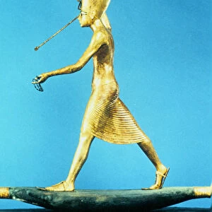 Model of the Pharaoh Tutankhamun on a reed boat spearing fish, Ancient Egyptian, c1325 BC