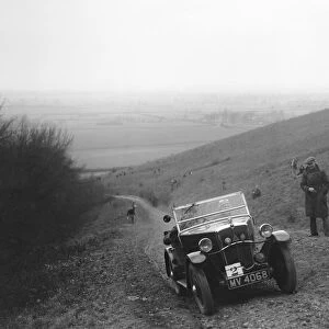 Morris Minor competing in a trial, Crowell Hill, Chinnor, Oxfordshire, 1930s. Artist: Bill Brunell