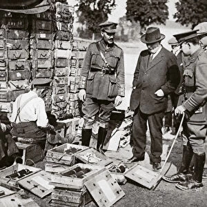 Mr Asquith watching men adjusting fuses, Somme campaign, France, World War I, 1916