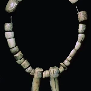 Neolithic necklace of bone and teeth