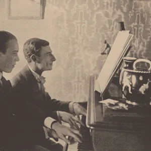 Nijinsky and Maurice Ravel at the piano playing a score from Daphnis and Chloe, 1912