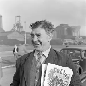 NUM official selling Coal magazine, South Yorkshire, 1959. Artist: Michael Walters