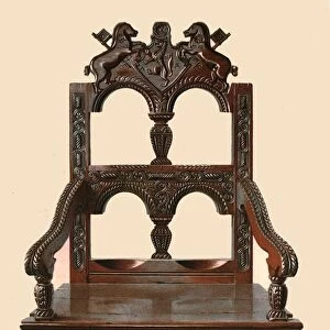 Oak Cacqueteuse chair, 1904. Artist: Shirley Slocombe
