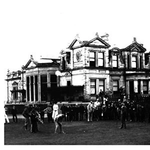 Old Tom Morris outside the Old Course Clubhouse at St Andrews in Scotland, c1900
