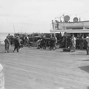 Passengers embarking on Southampton ferry. Creator: Kirk & Sons of Cowes