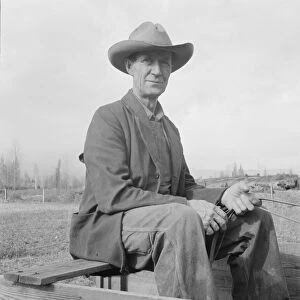 Possibly: Farmer from Nebraska now developing eighty-acre stump farm, Bonner County, Idaho, 1939. Creator: Dorothea Lange