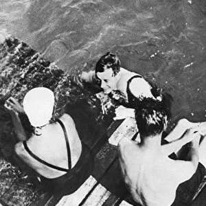 The Prince of Wales with friends on a raft, the Riviera, c1930s