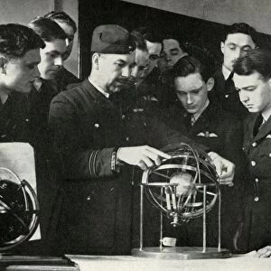 RAF personnel learning navigation during the Second World War, 1941. Creator: Charles Brown