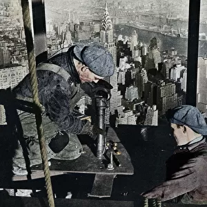 Rivetting the last bolts on The Morning Mast of the Empire State building, c1931. Artist: Lewis Wickes Hine