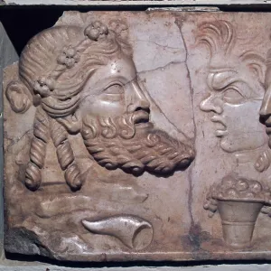 Roman marble relief of dramatic masks