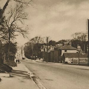 Where The Roman Road To Dover Crosses Shooters Hill Beyond Blackheath, c1935. Creator: W Whiffin