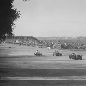 Rubber Duck, Austin 7 of LP Driscoll, leading two MG Cs, BRDC 500 Mile Race, Brooklands, 1931