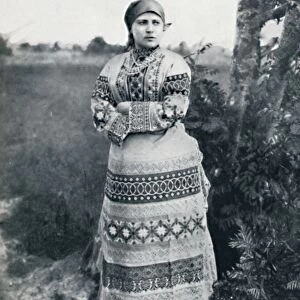 A Russian peasant in costume, 1912
