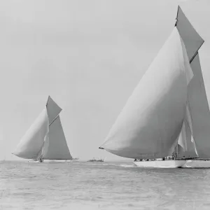 The sailing yachts White Heather and Shamrock, race downwind