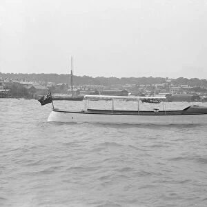 Saunders motor launch at anchor, 1914. Creator: Kirk & Sons of Cowes