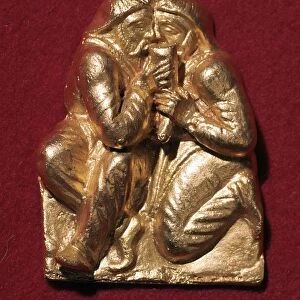 Scythian plaque showing two men drinking from a horn, 4th century BC