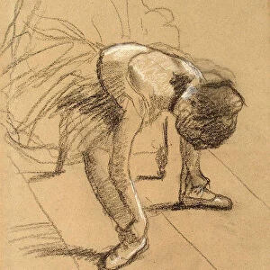 Seated Dancer Adiusting her Shoes, c1876. Artist: Edgar Degas