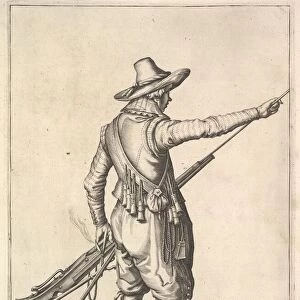A soldier pulling out the ramrod from its holder, from the Musketeers series, plate 25