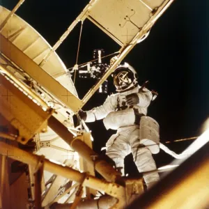 Space Shuttle - spacewalk, 1980s. Creator: NASA