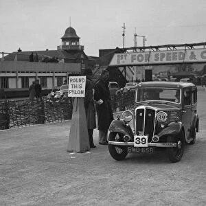 Standard Nine saloon competing in the JCC Rally, Brooklands, Surrey, 1939. Artist: Bill Brunell