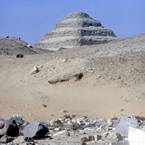 Step Pyramid of King Djoser (Zozer) behind ruins of temple, Saqqara, Egypt, c2600 BC. Artist: Imhotep
