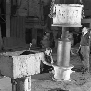 Stripping a steel casting, Wombwell Foundry, South Yorkshire, 1963