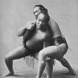 A sumo wrestling bout between a pair of Japanese professionals, 1902