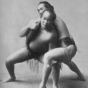 A sumo wrestling bout between a pair of Japanese professionals, 1902