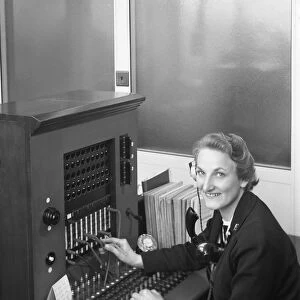 Switch board operator, Spillers Animal Foods, Gainsborough, Lincolnshire, 1960. Artist