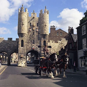Tetley shire horses and dray in front of Micklegate Bar, York, North Yorkshire, 1969