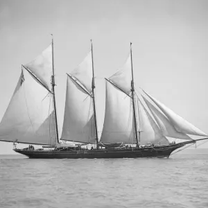 The three-mast auxiliary schooner Invincible, 1911. Creator: Kirk & Sons of Cowes The three-mast auxiliary schooner Invincible, 1911. Creator: Kirk & Sons of Cowes